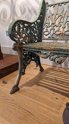 Lot 668 - A Victorian painted cast iron garden bench