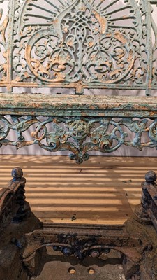 Lot 668 - A Victorian painted cast iron garden bench