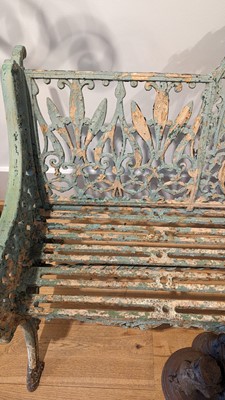 Lot 668 - A Victorian painted cast iron garden bench