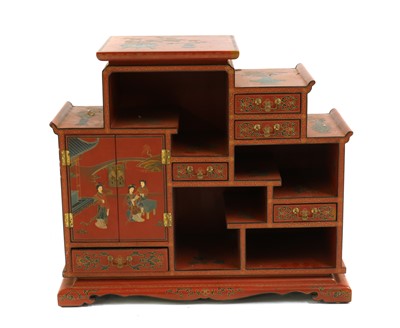 Lot 483 - A Japanese lacquered table cabinet