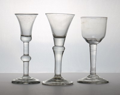 Lot 182 - A group of three plain stem wine glasses