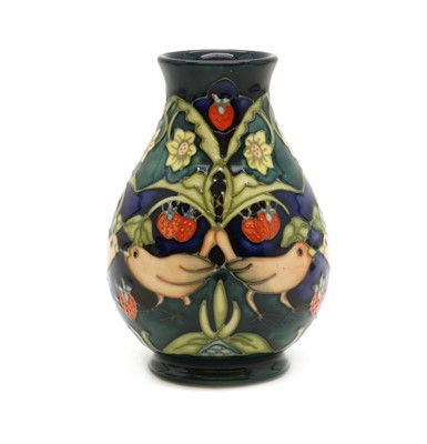 Lot 134 - A Moorcroft pottery 'Strawberry Thief' pattern vase