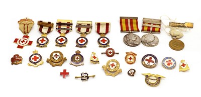 Lot 241 - A collection of Red Cross enamel long service medals