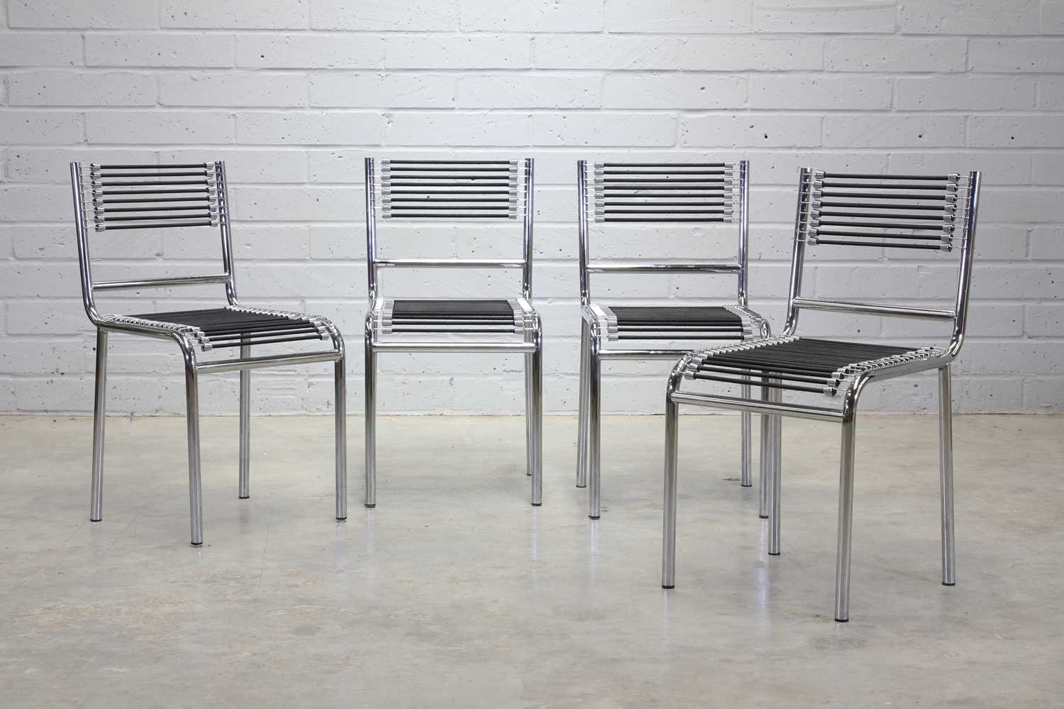 Lot 215 - A set of four 'Sandows' chairs