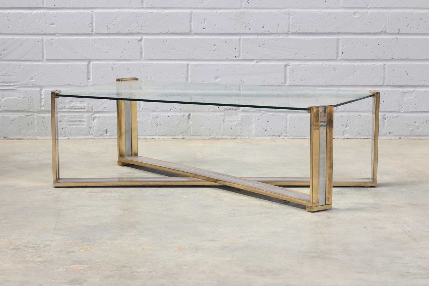 Lot 381 - An Italian chrome and brass-lacquered coffee table