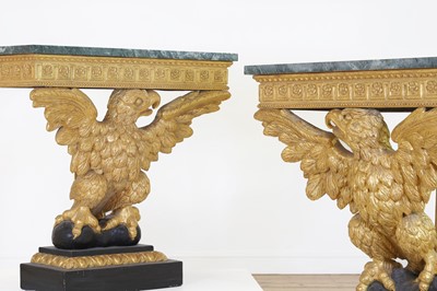 Lot 101 - A pair of George II-style carved giltwood console tables