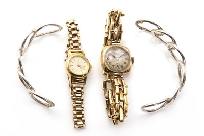 Lot 448 - Two ladies' gold mechanical bracelet watches