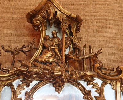 Lot 52 - ☘ A giltwood mirror of Chippendale style