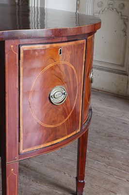 Lot 30 - ☘ A late George III mahogany bow-front sideboard