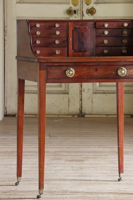 Lot 226 - ☘ A small mahogany desk with a raised back