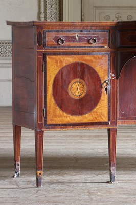 Lot 21 - A George IV satinwood and mahogany bow-front sideboard