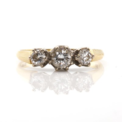 Lot 100 - An 18ct gold three stone diamond ring