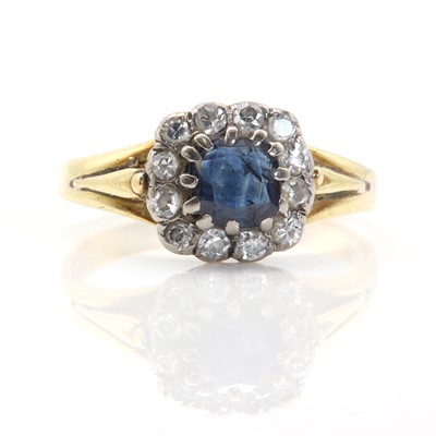 Lot 61 - A gold sapphire and diamond cluster ring