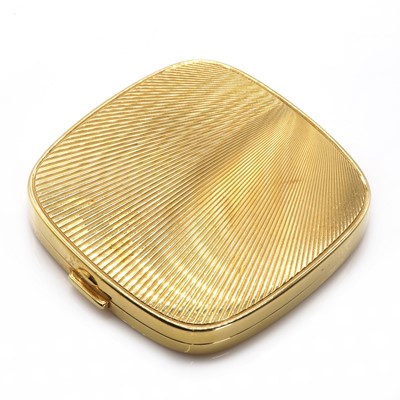 Lot 88 - A gold flat section hinged powder compact