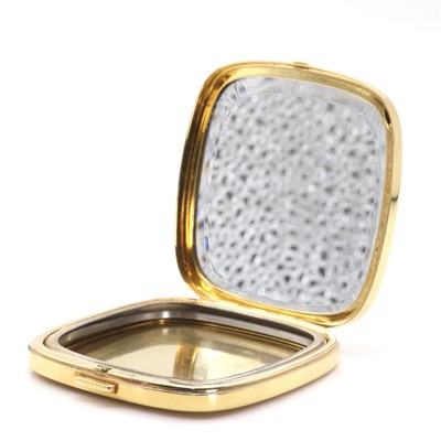 Lot 88 - A gold flat section hinged powder compact