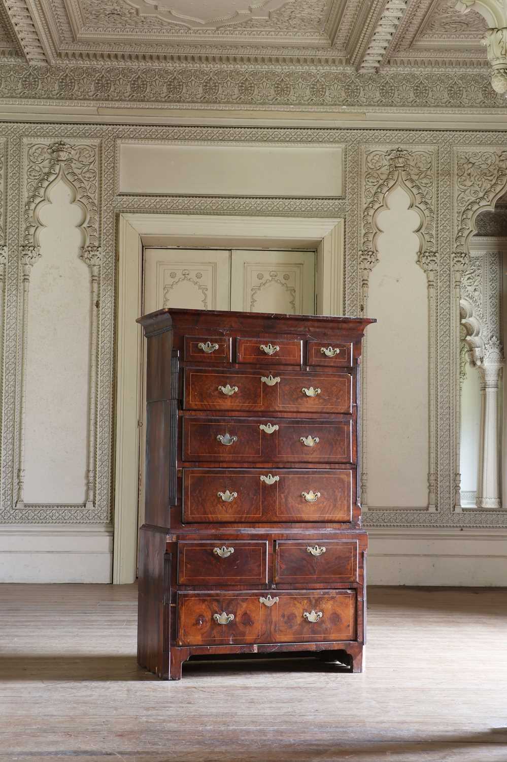 Lot 141 - ☘ A walnut chest on chest