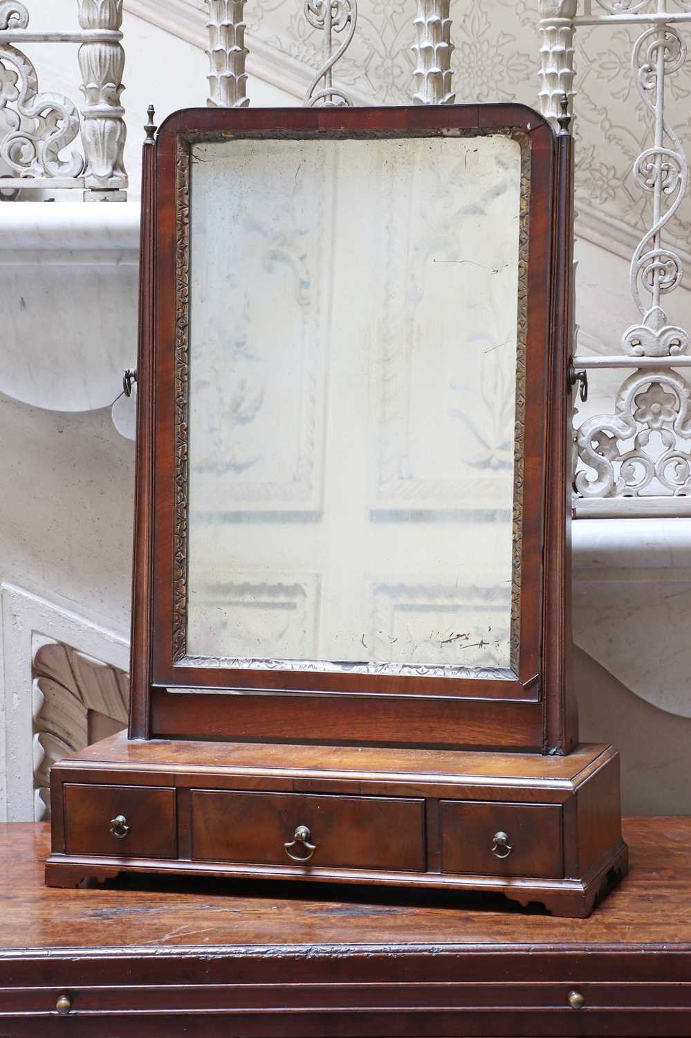 Lot 143 - ☘ A walnut dressing table mirror