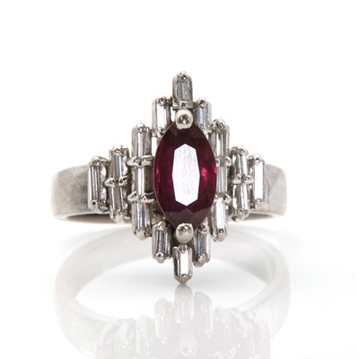 Lot 130 - A gold ruby and diamond ring