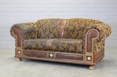 Lot 438 - A Versace 'Medusa' two-seater sofa