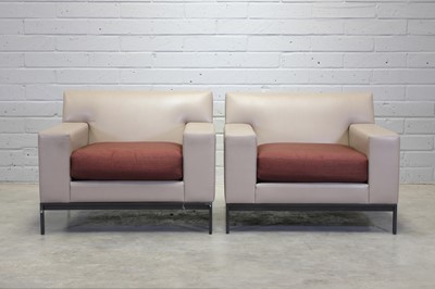 Lot 250 - A pair of Christian Liaigre cream leather armchairs