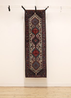 Lot 326 - A Persian blue ground wool runner