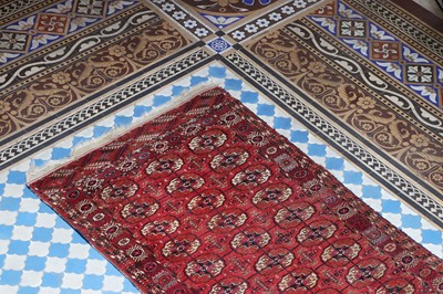 Lot 160 - ☘ A small Turkoman brick-ground rug