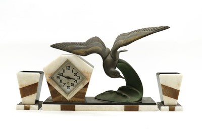 Lot 206 - An Art Deco onyx mantle clock