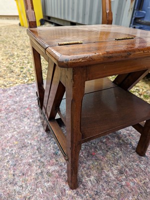 Lot 408 - An Arts and Crafts walnut metamorphic library chair