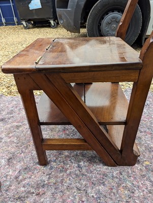 Lot 408 - An Arts and Crafts walnut metamorphic library chair