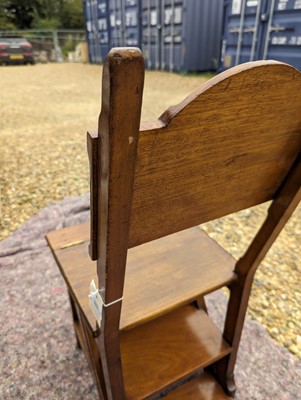 Lot 408 - An Arts and Crafts walnut metamorphic library chair