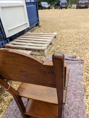 Lot 408 - An Arts and Crafts walnut metamorphic library chair