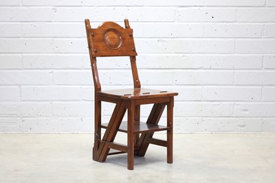 Lot 408 - An Arts and Crafts walnut metamorphic library chair