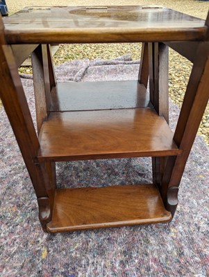 Lot 408 - An Arts and Crafts walnut metamorphic library chair
