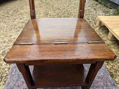 Lot 408 - An Arts and Crafts walnut metamorphic library chair