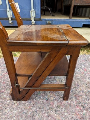 Lot 408 - An Arts and Crafts walnut metamorphic library chair