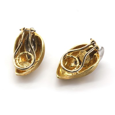 Lot 65 - A pair of two colour gold flame design earrings by Henry Dunay, c.1990