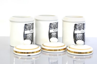 Lot 318 - An Italian Fornasetti group of three porcelain owl storage jars or canisters