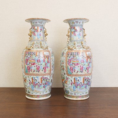 Lot 142 - A pair of Chinese Canton famille rose vases