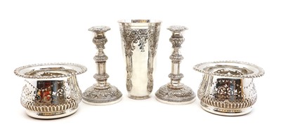 Lot 125 - A pair of silver plated candlesticks