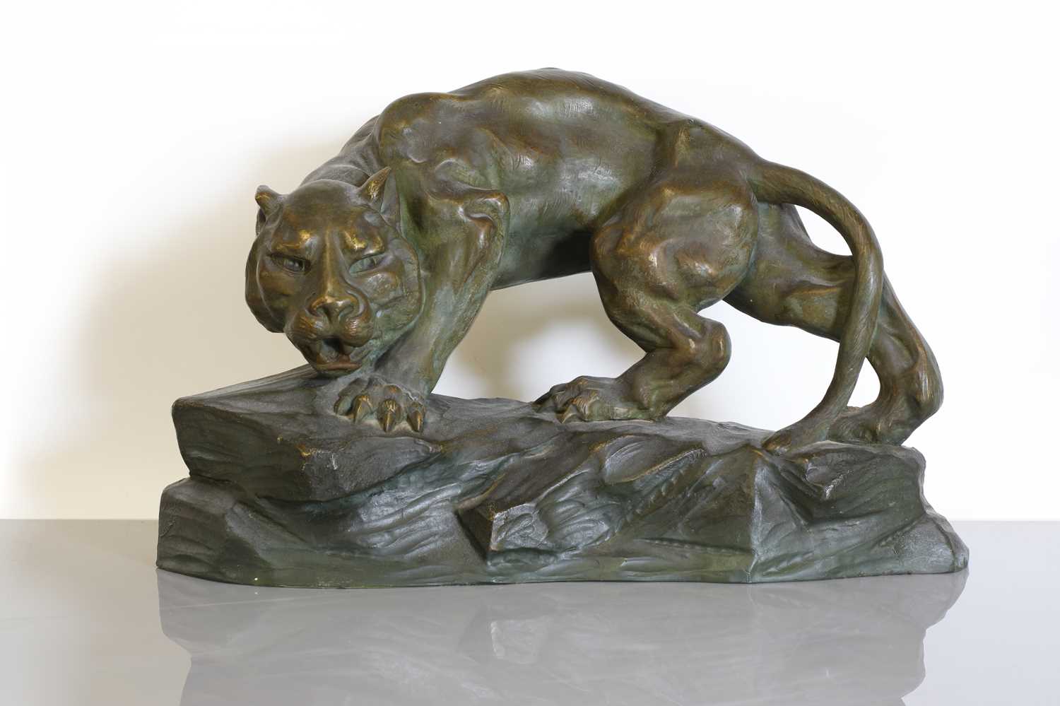 Lot 173 - An Art Deco terracotta figure of a panther