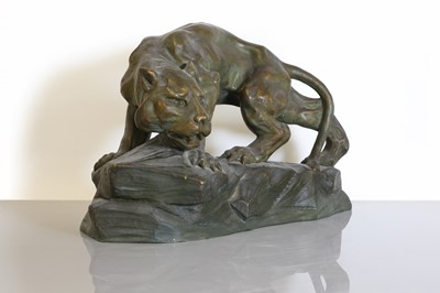 Lot 173 - An Art Deco terracotta figure of a panther