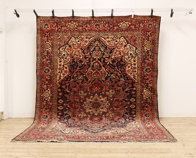 Lot 308 - A Heriz carpet