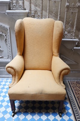 Lot 150 - ☘ A George III mahogany-framed wingback armchair
