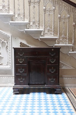 Lot 16 - A George III mahogany kneehole desk