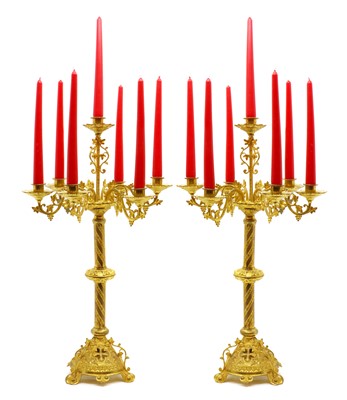 Lot 203 - A pair of ecclesiastical gilt metal candelabra