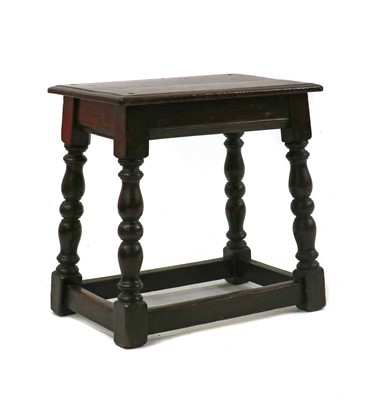 Lot 390 - A oak joint stool