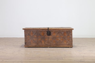 Lot 490 - A carved wooden chest