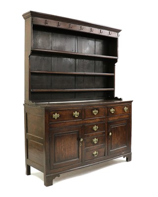 Lot 445 - A George III oak dresser