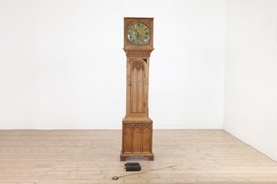 Lot 451 - A late Regency oak longcase clock