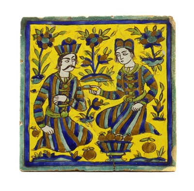 Lot 160 - A Persian Qajar pottery tile